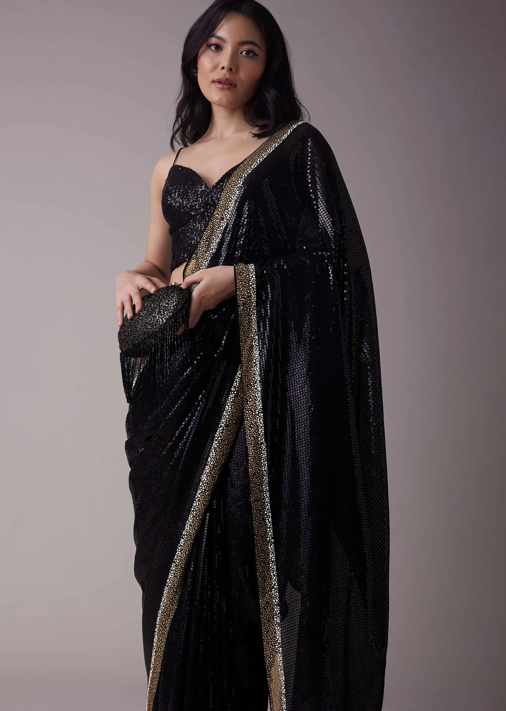 Black Sequins Saree With An Embellished Border