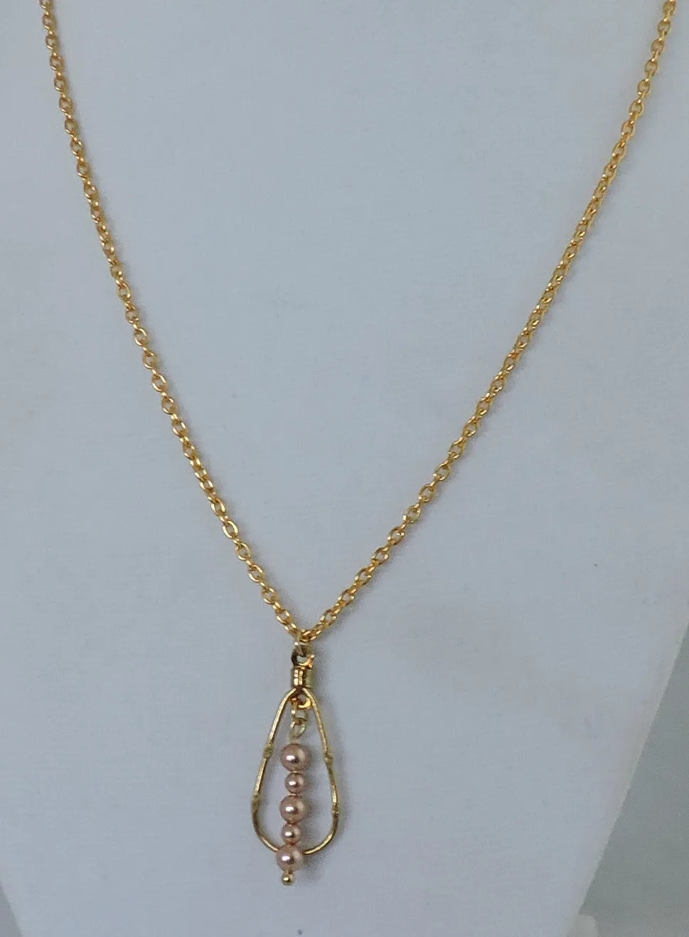 Swarovski Pearls w/Gold Frame Pendant